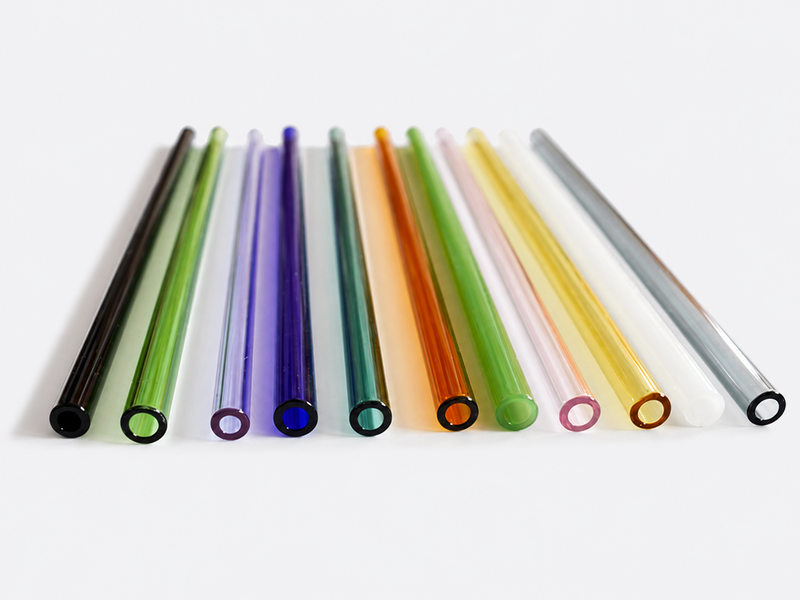 Assorted thin colored glass tubes and rods