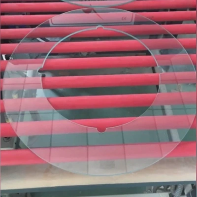 Custom circular sight glass disc with a large center hole
