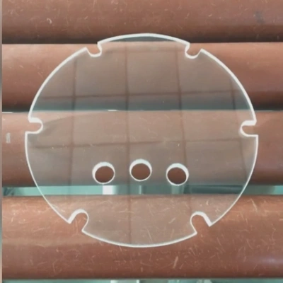 Custom round sight glass with holes and edge notches