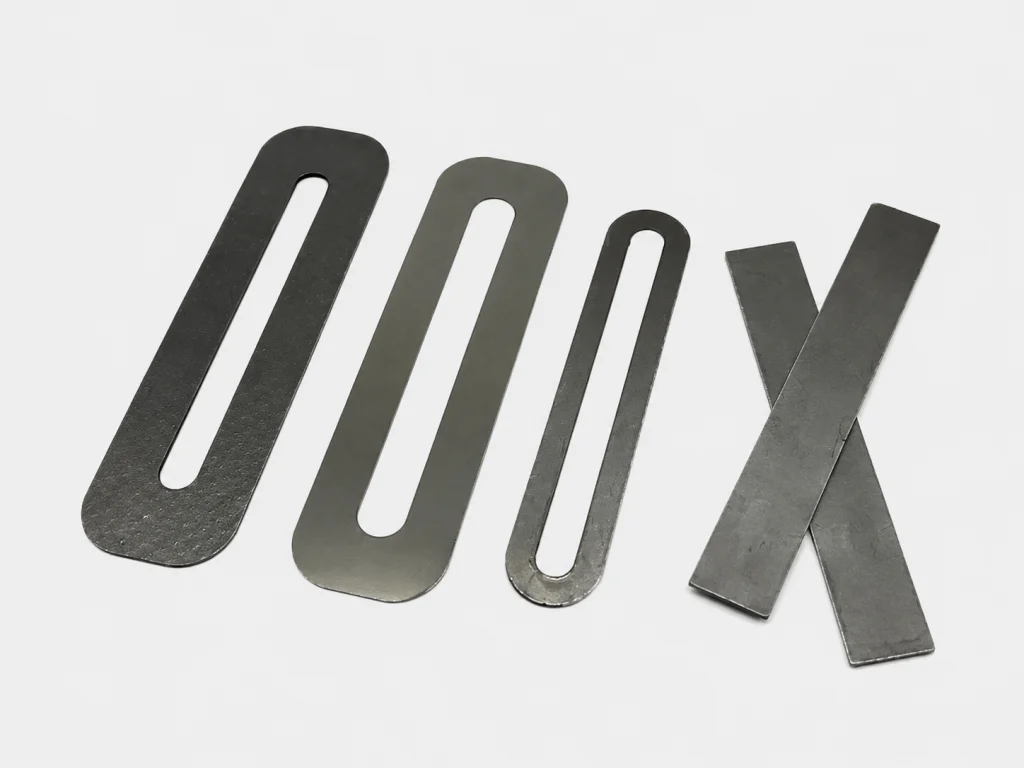 Custom-shaped graphite gauge gaskets and sealing strips