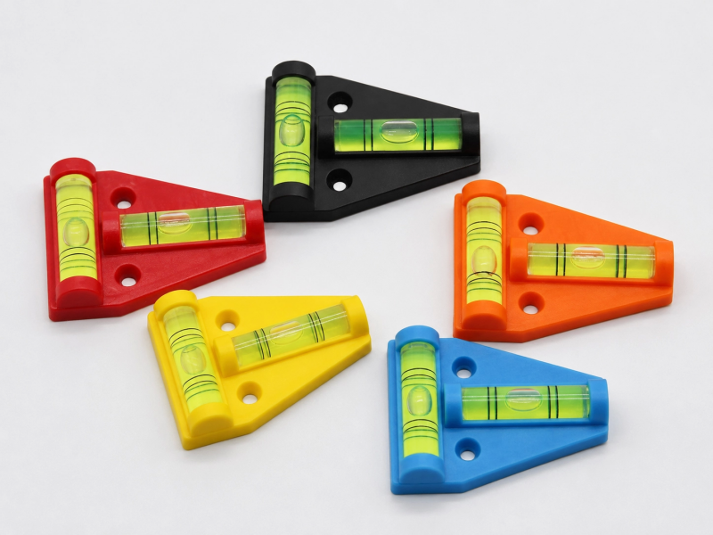 Colorful two-axis level indicators with triangular mounting bases